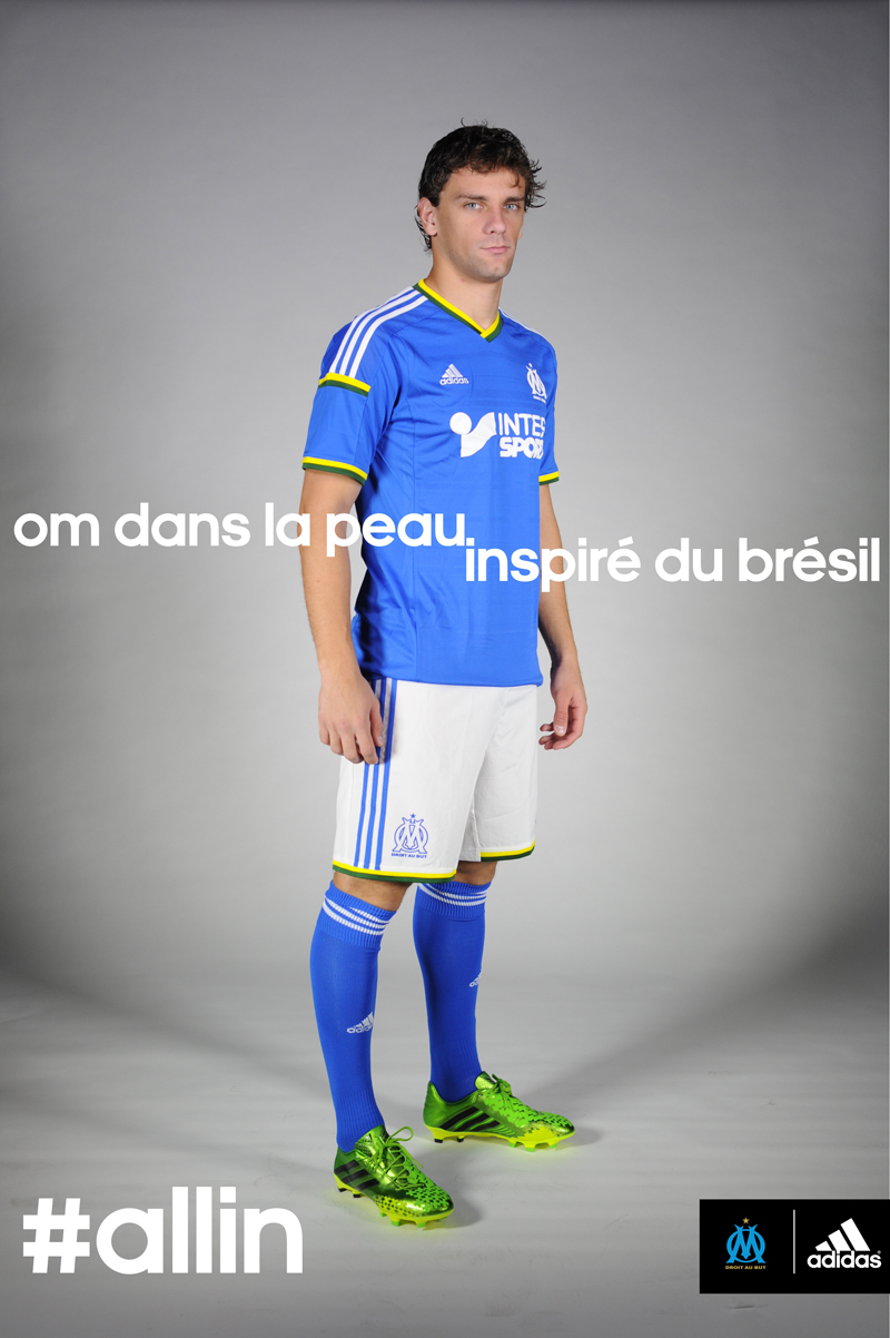 https://sportbuzzbusiness.fr/wp-content/uploads/2013/11/Lucas-Mendes-MAILLOT-OM_BR%c3%a9sIL-2014-adidas.jpg